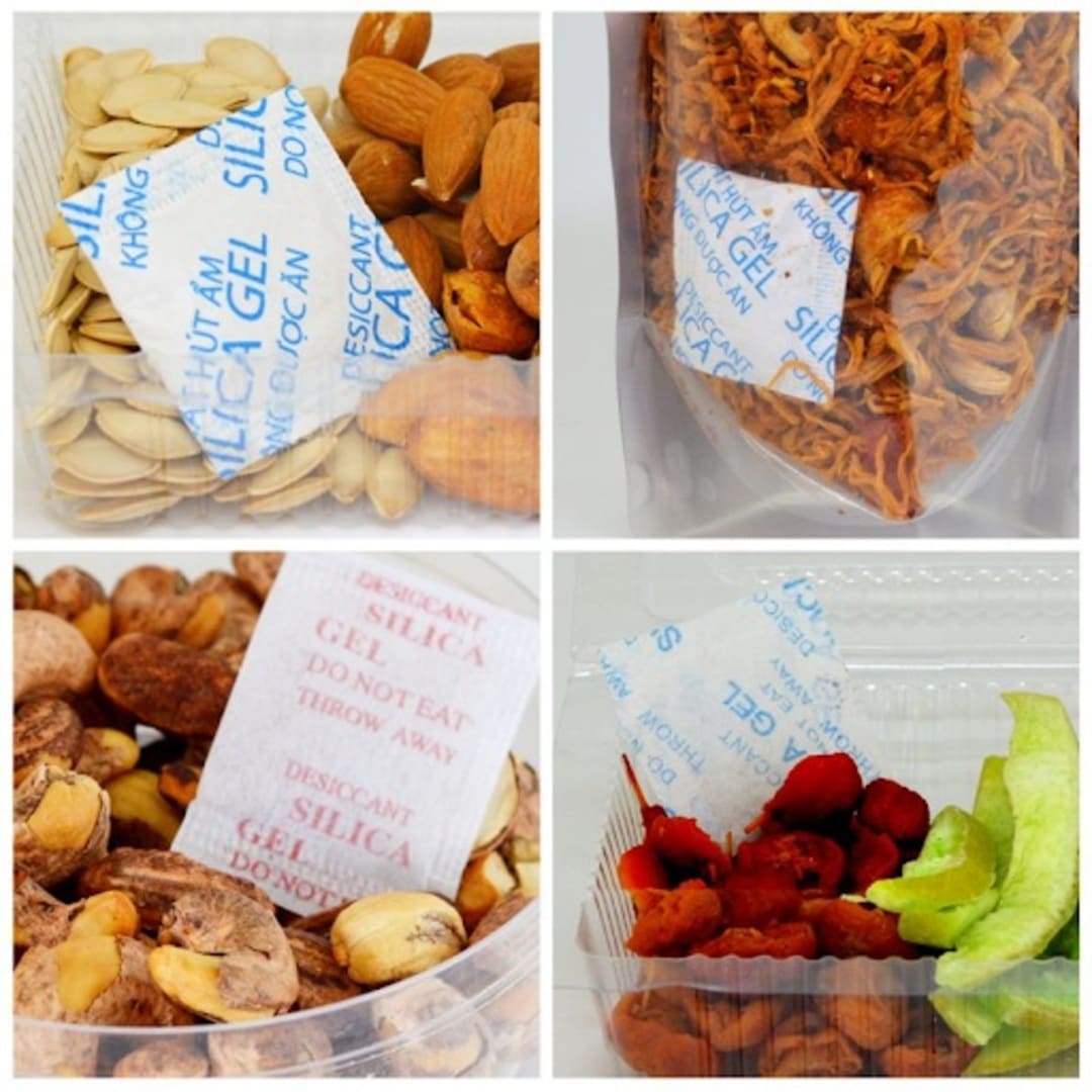 Gói hút ẩm silica gel food-grade Tyvek bên cạnh hộp hạt điều xuất khẩu — tiêu chuẩn FDA 21 CFR 184.1711 CEMACO Sài Gòn